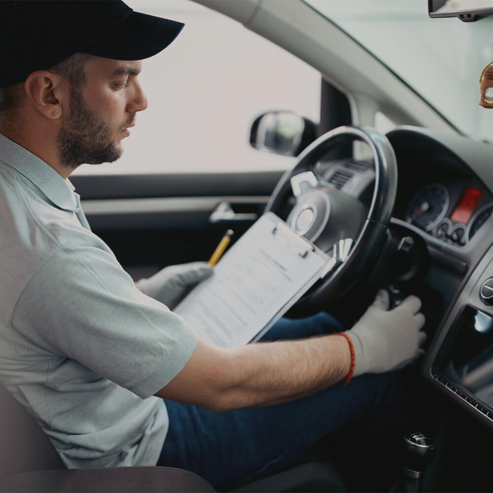 Rabbit Repair founder working on car